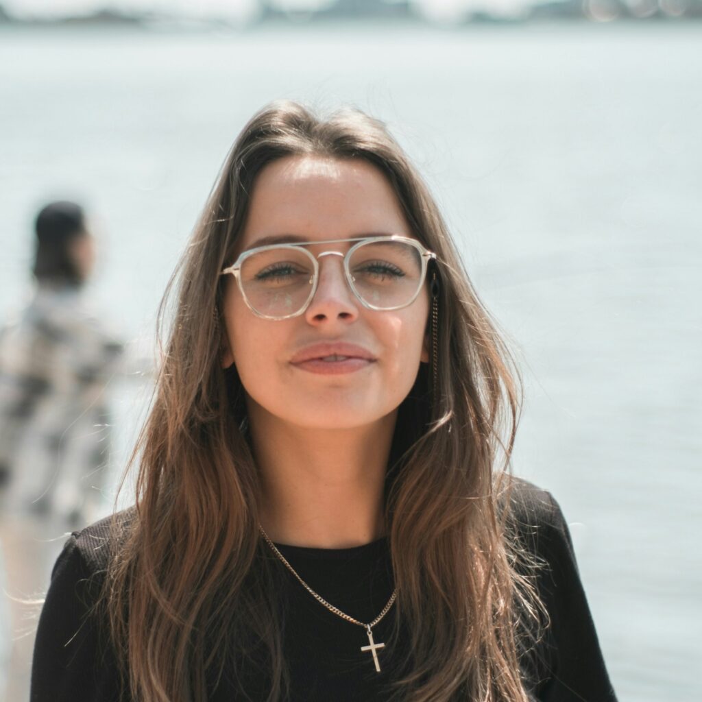 Woman with glasses and brown hair
